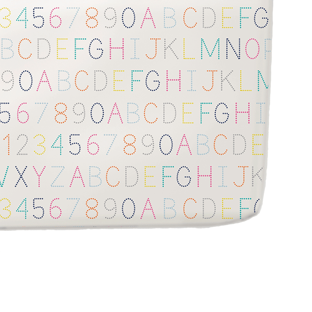 Pehr Alphabet Organic Crib Sheet. GOTS Certified Organic Cotton. Screen printed by hand using AZO-Free dyes. White with colourful letters and numbers.