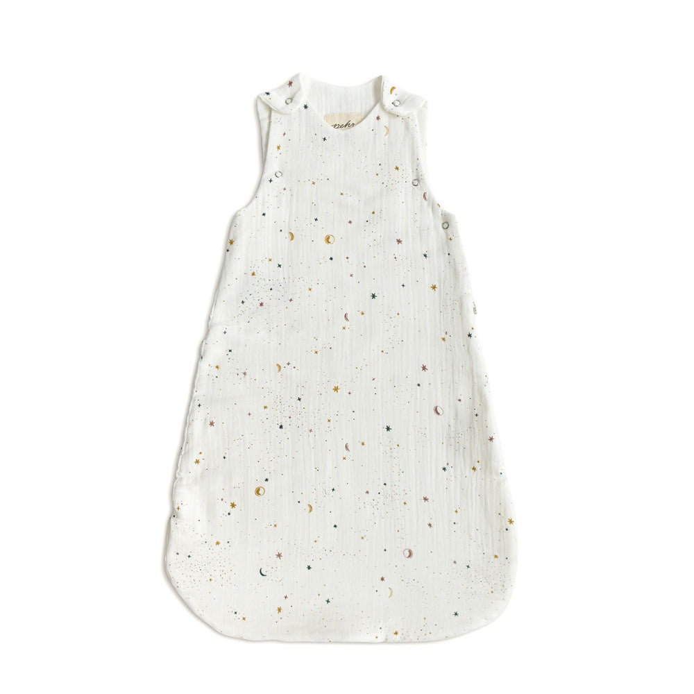Pehr Celestial 1.0 TOG Sleep Bag. 100% organic muslin cotton. White with navy, marigold and rose tonal stars and moon print.