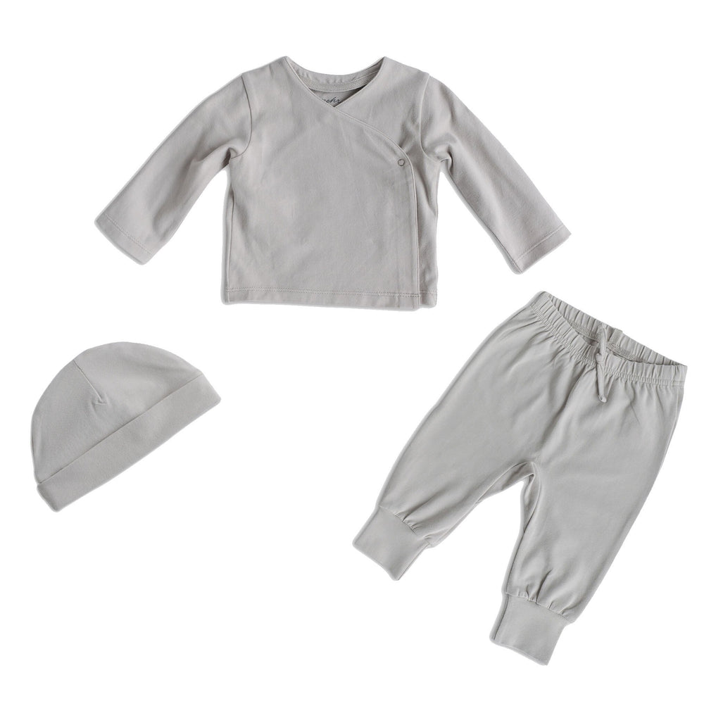 Pehr Dove Grey 3-Piece Set. Organic. Medium grey Pehr Essentials wrap cardigan, Pehr Essentials pant, and Pehr Essentials Hat.
