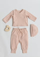 Pehr Powder Pink Essentials Hat with Pehr Powder Pink Essentials Pant and Essentials Wrap Cardigan. GOTS Certified Organic Cotton & Dyes. Light pink hat.