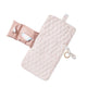 Pehr Rose Pink Organic On The Go Travel Change Pad opened up beside Pehr Pebble Organic On the Go Teether. GOTS Certified Organic Cotton & Dyes. White with pink stripes.