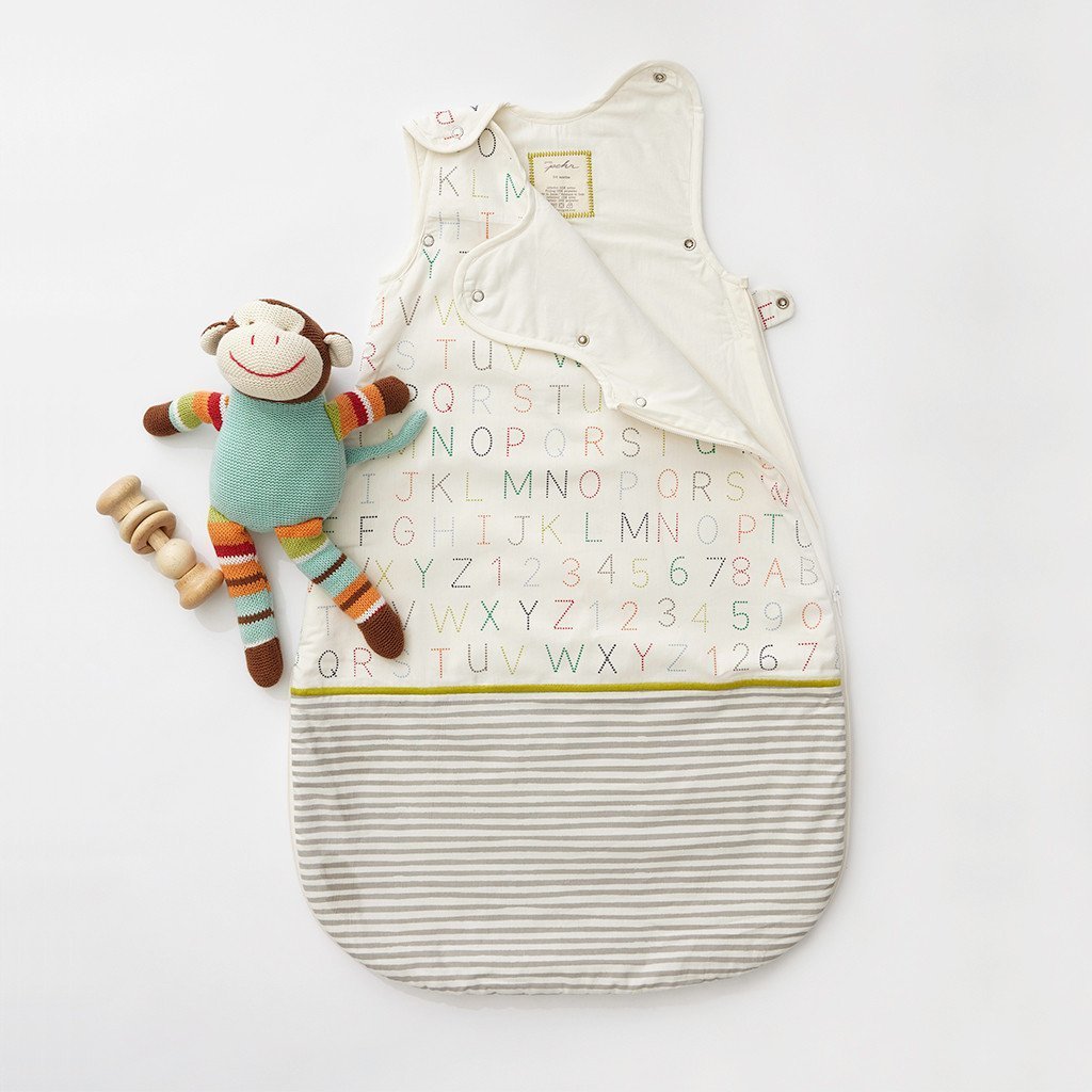 Pehr Alphabet 1.7 TOG Sleep Bag with monkey toy. Hand printed. Off-white with alphabet pattern.