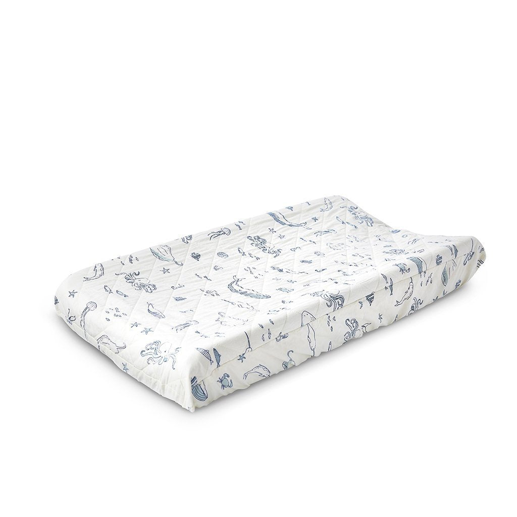Pehr Life Aquatic Change Pad Cover. Hand printed. White with navy blue sea creatures in line drawing print.