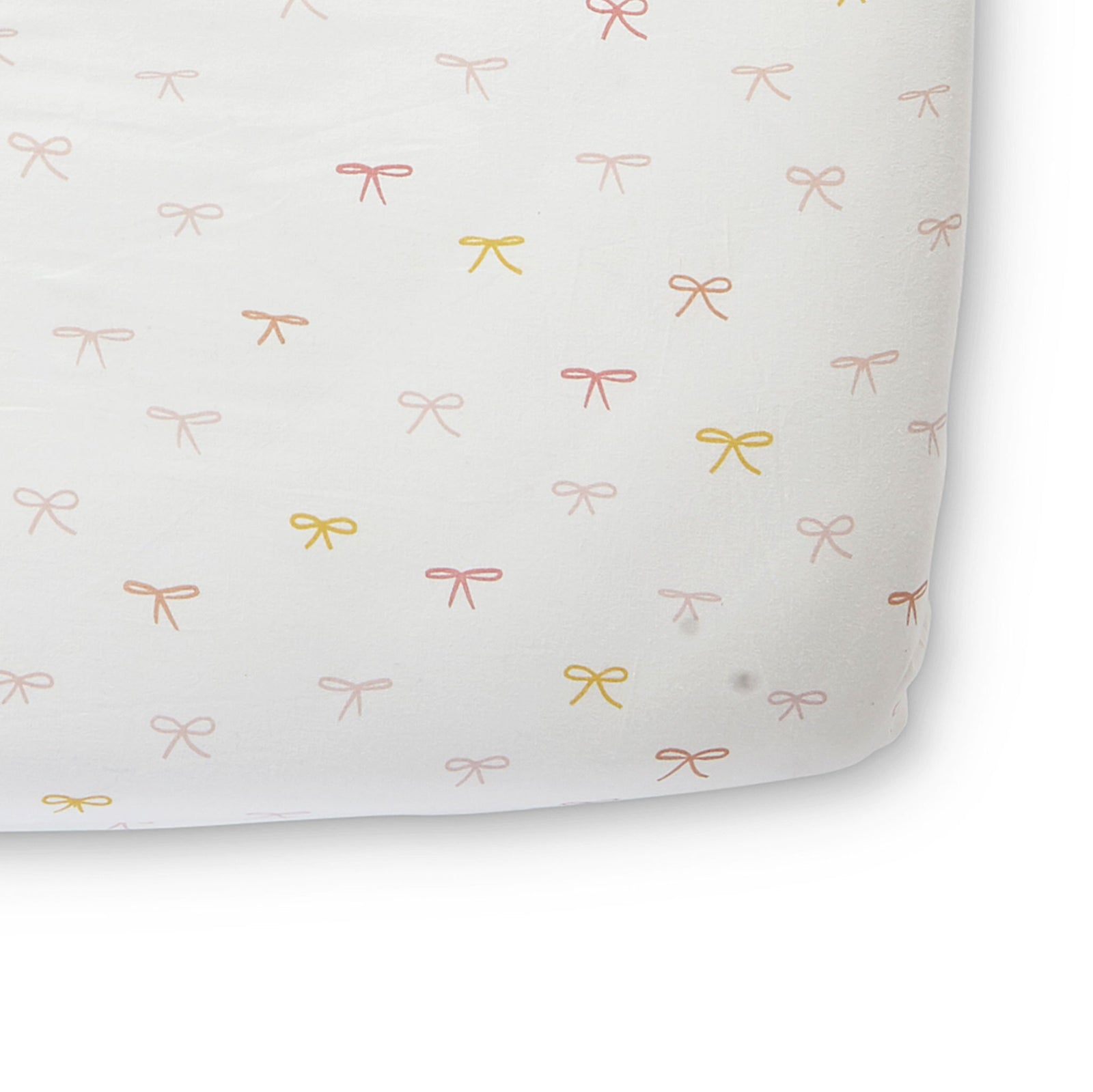Pehr Jolie Organic Crib Sheet. GOTS Certified Organic Cotton. Screen printed by hand using AZO-Free dyes. White with colourful bows.
