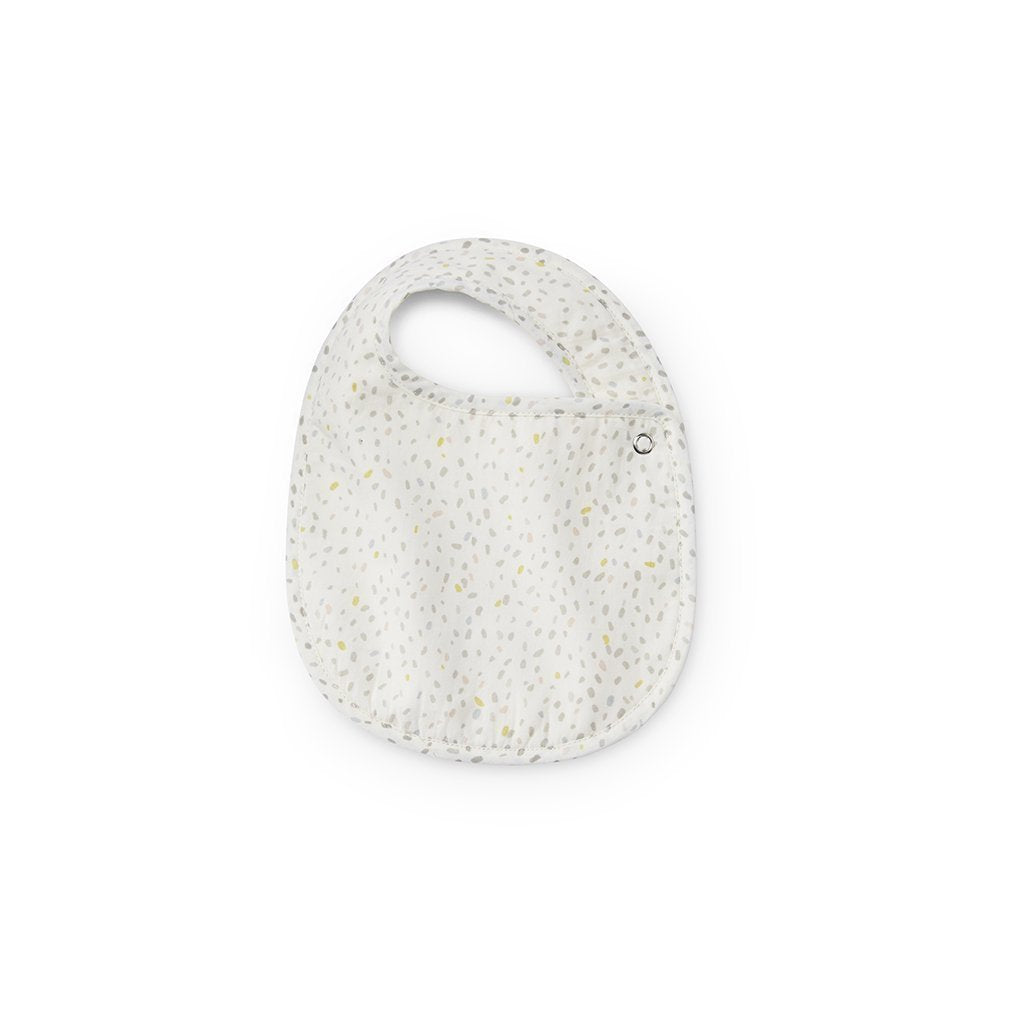 One of the two bibs from Pehr Magical Forst & Multi Speck Bib set of 2. Hand printed. White with multi-coloured dots.