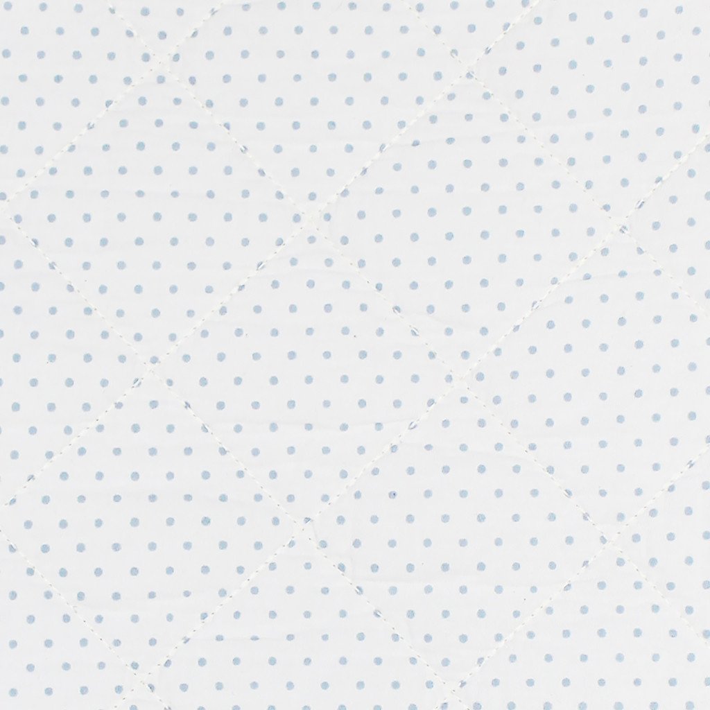 Close up of Pehr Pin Dot Blue Change Pad Cover. Hand printed. White with blue polka dots.