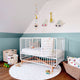 Nursery decorated with Pehr Pull Toys printed items