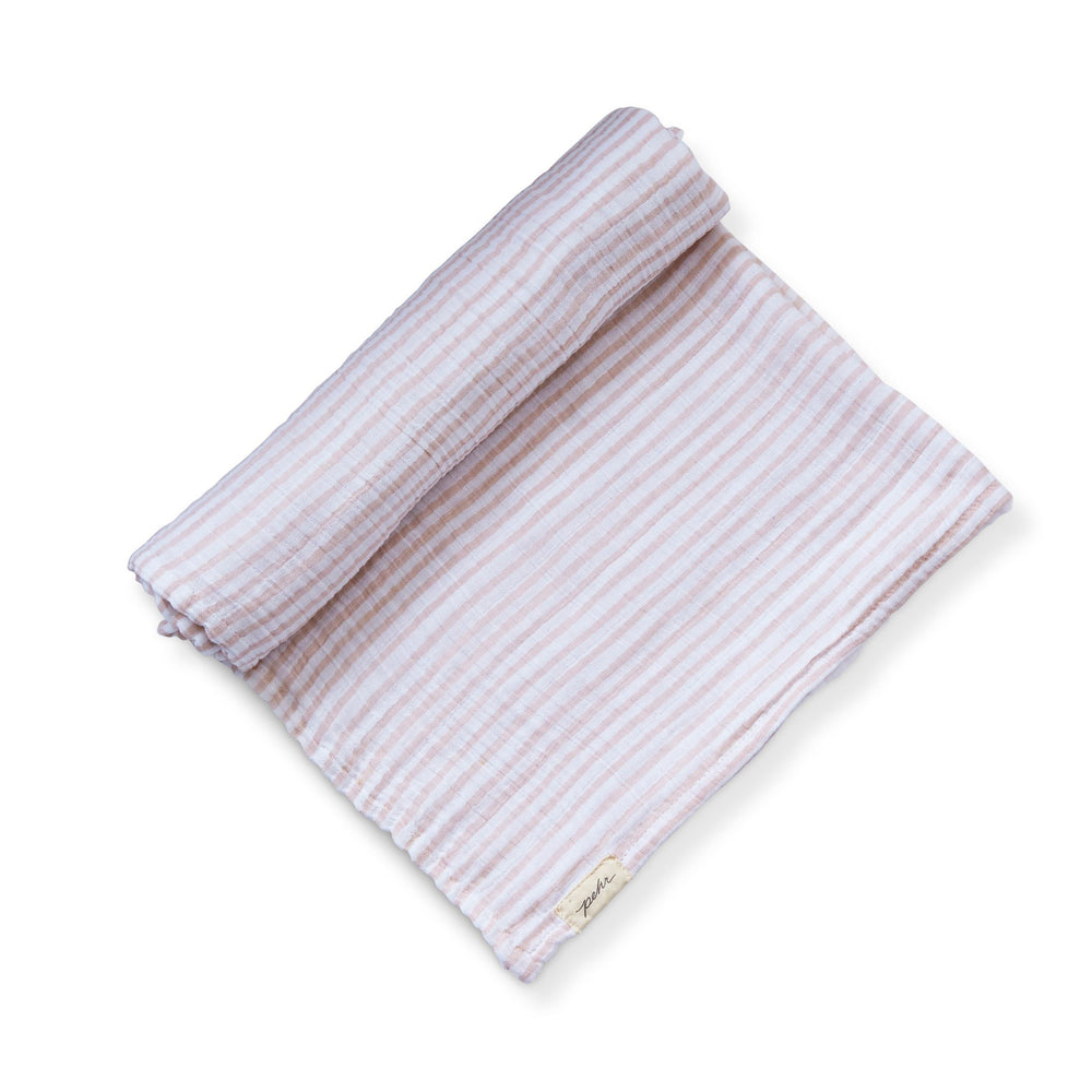 Pehr Stripes Away Petal Organic Striped Swaddles. GOTS Certified Organic Cotton. White with light pink stripes.