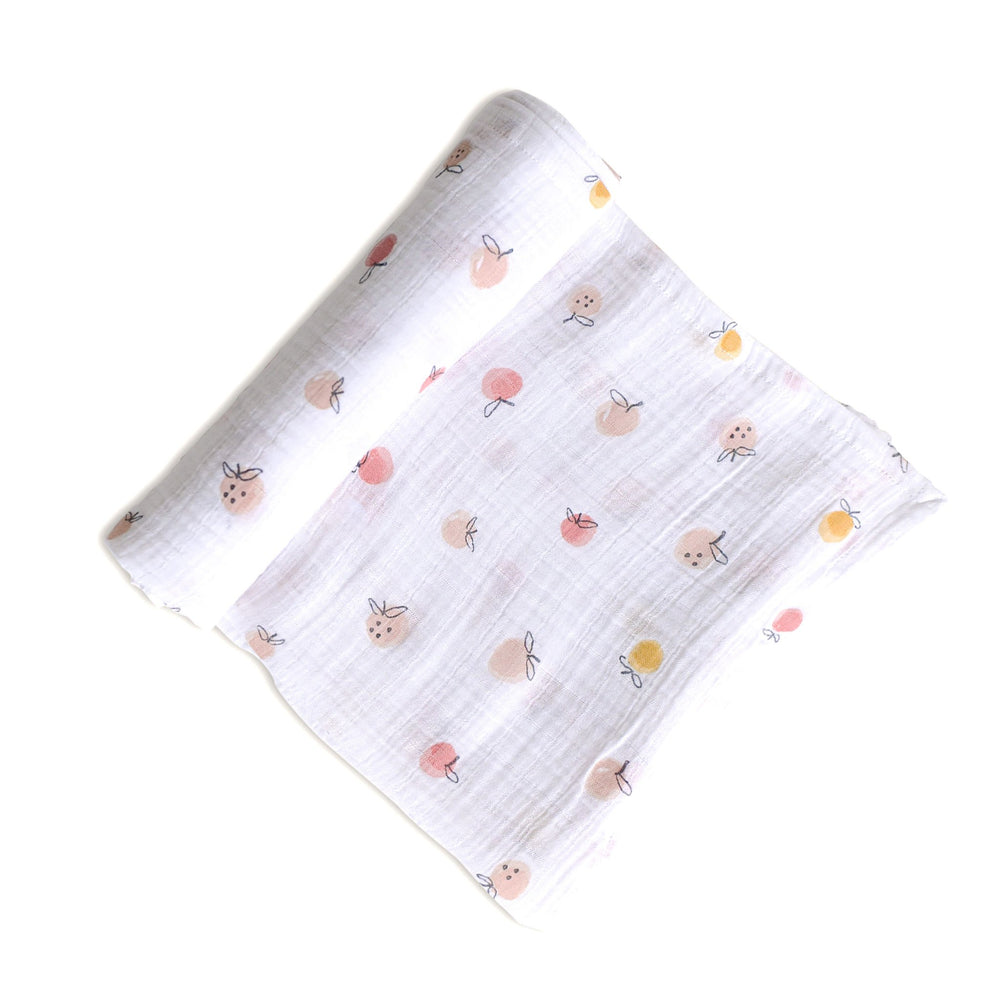 Pehr Strawberry Fields Organic Novelty Swaddles. Organic cotton, hand printed. White with painted strawberry pattern.