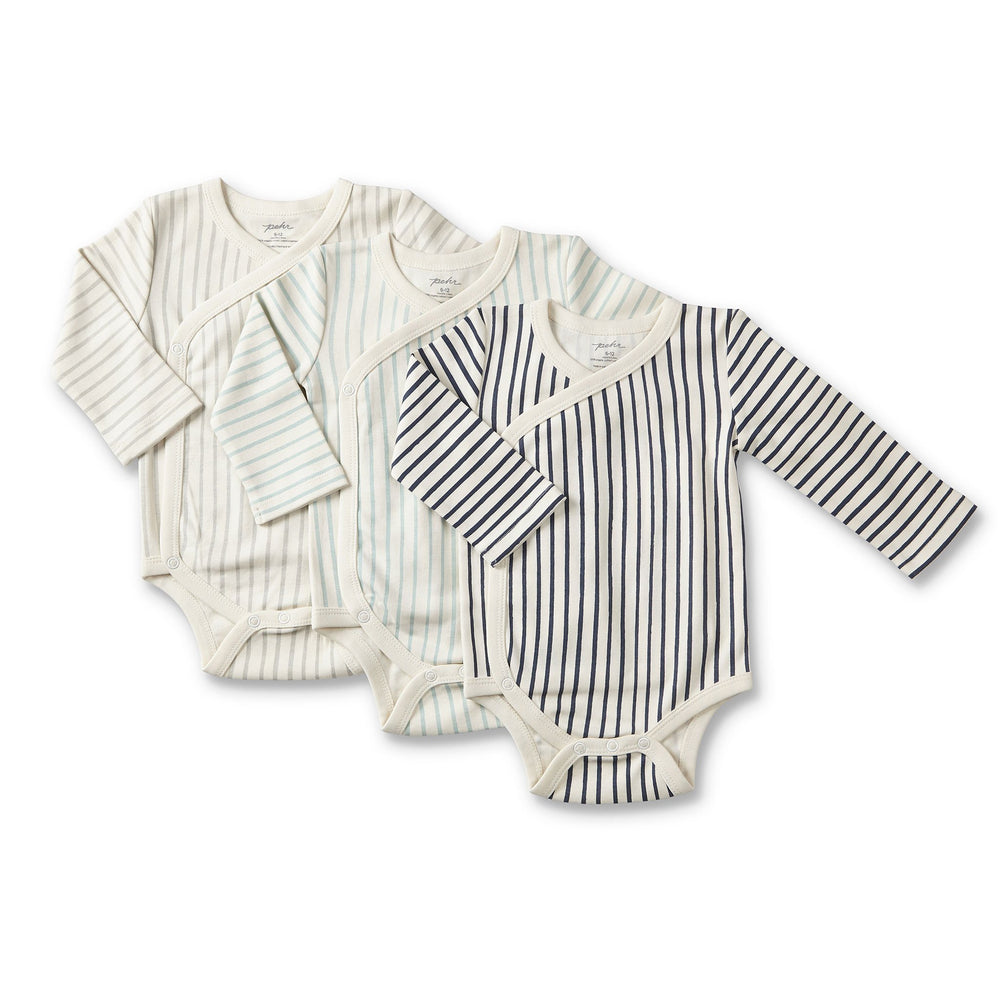 Pehr Stripes Away Ink Blue, Pebble Grey, and Sea Organic Kimono One-Pieces, Long Sleeve, stacked on top of each other. GOTS Certified Organic Cotton & Dyes.