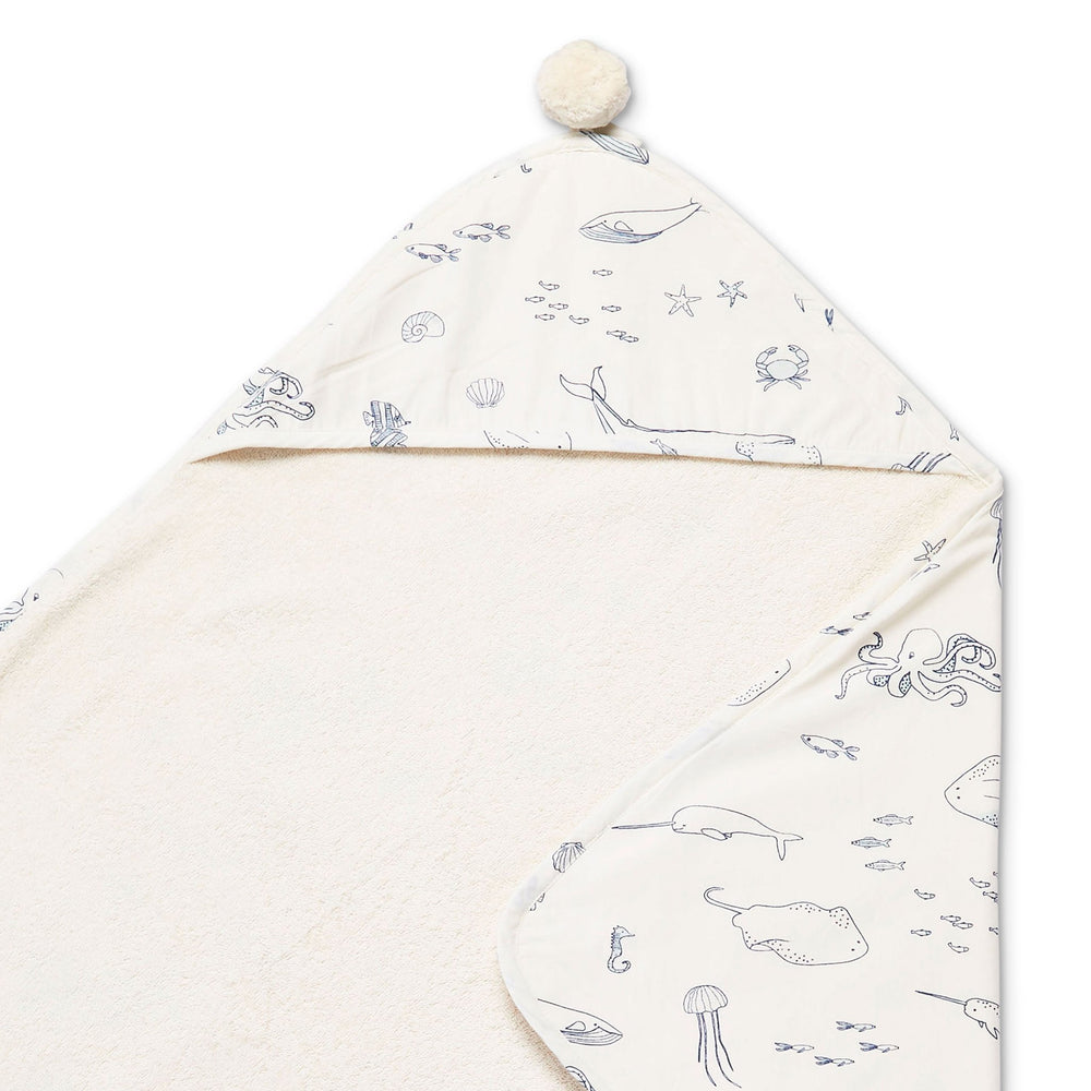 Pehr Life Aquatic Hood Towel. Hand printed. Cotton. White with blue sea creatures, terry cloth inside.